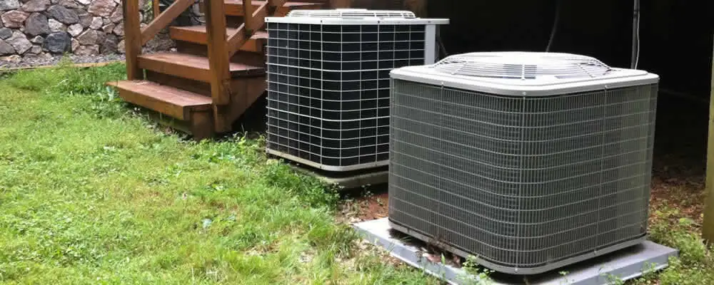 Heat pump installation and service units outside a home in Long Beach, CA